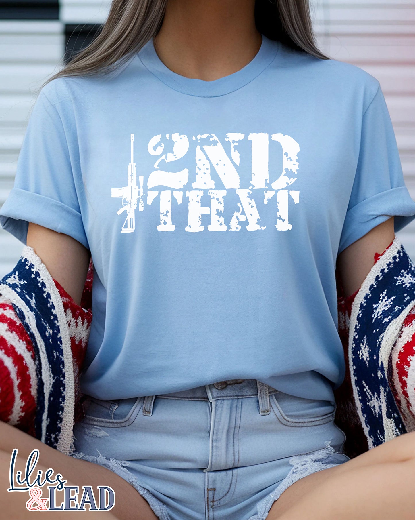 Baby Blue tee with 2nd that in distressed white with rifle detail