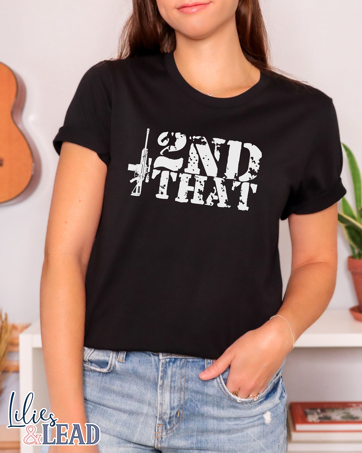 Black tee with 2nd that in distressed white with rifle detail