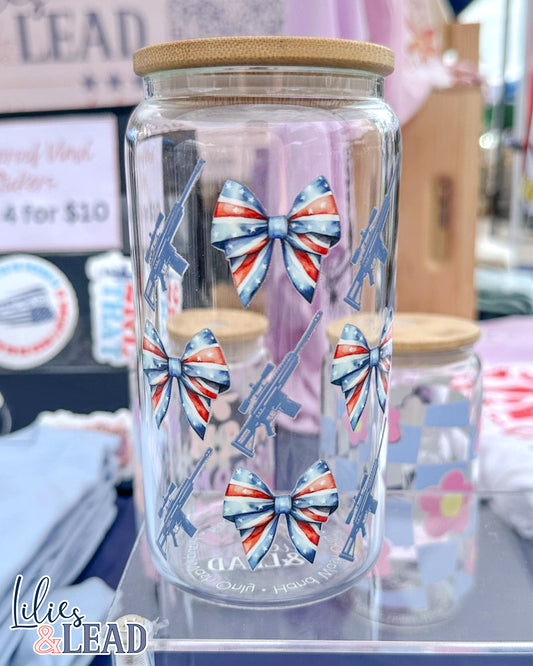 16oz glass can cup product photo with red white and blue patriotic bows and rifle details