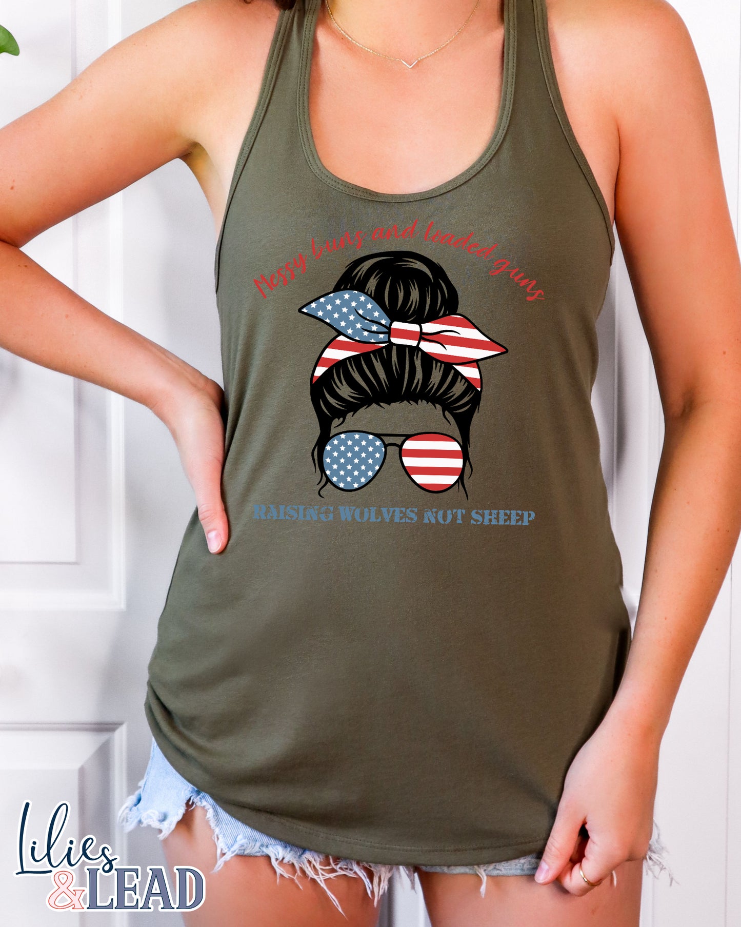 Military green Tank top with messy bun patriotic design that says messy buns and loaded guns raising wolves not sheep.