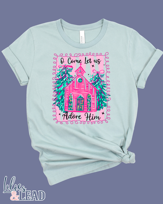 Light blue t-shirt with a pink church and Christmas trees design