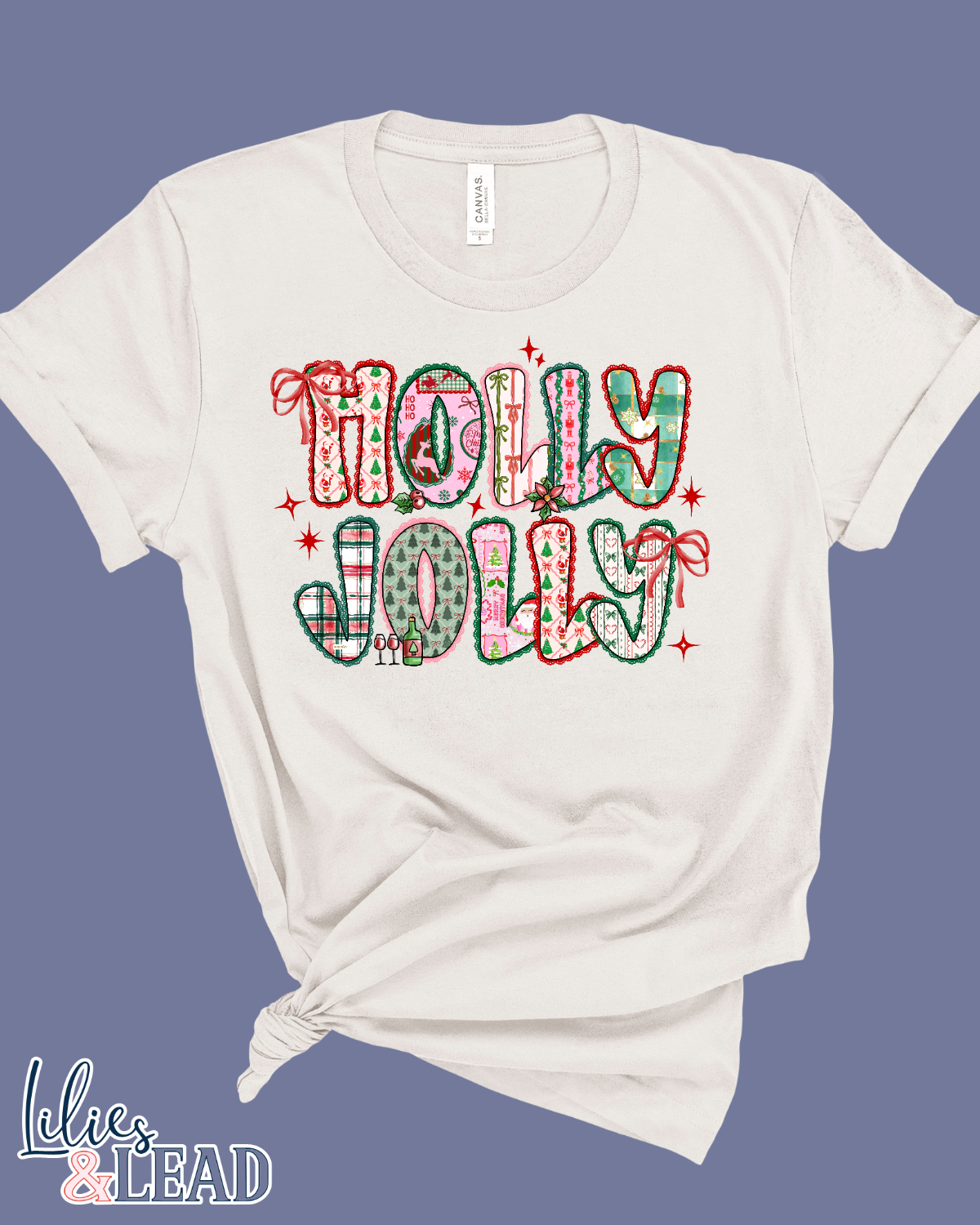 White t-shirt with 'Holly Jolly' patchwork design