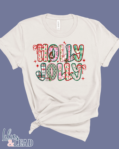 White t-shirt with 'Holly Jolly' patchwork design