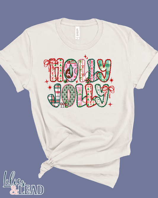 White t-shirt with 'Holly Jolly' patchwork design