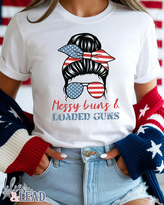 white tee shirt  on model with messy buns design wearing patriotic bandana and sunglasses featuring the phrase Messy buns and loaded guns