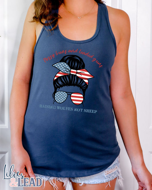 Indigo Tank top with messy bun patriotic design that says messy buns and loaded guns raising wolves not sheep.