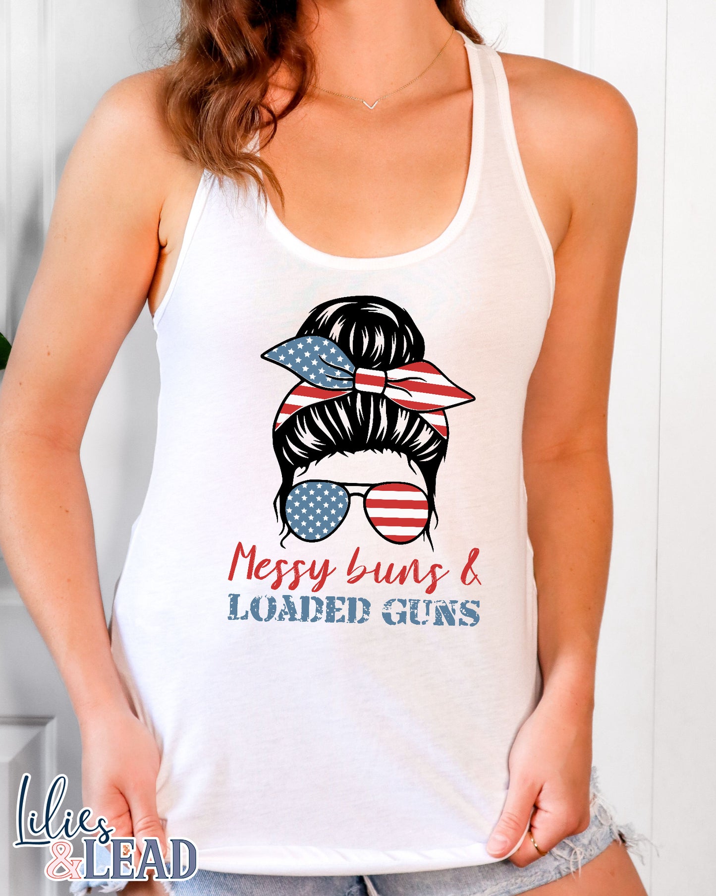 White Tank top with messy bun patriotic design that says messy buns and loaded guns 