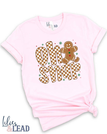 Pink t-shirt with 'Oh Snap' gingerbread design on a white background